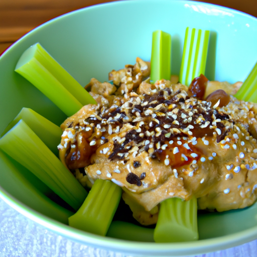 A bowl of celery, peanut butter and raisins topped with a sprinkle of sesame seeds.