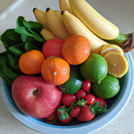 A bowl of bright and colorful fruits and vegetables.
